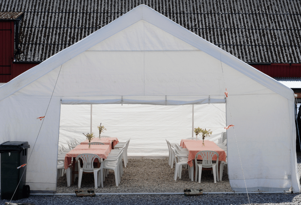Outdoor event tent with guest seating in Reisterstown, MD